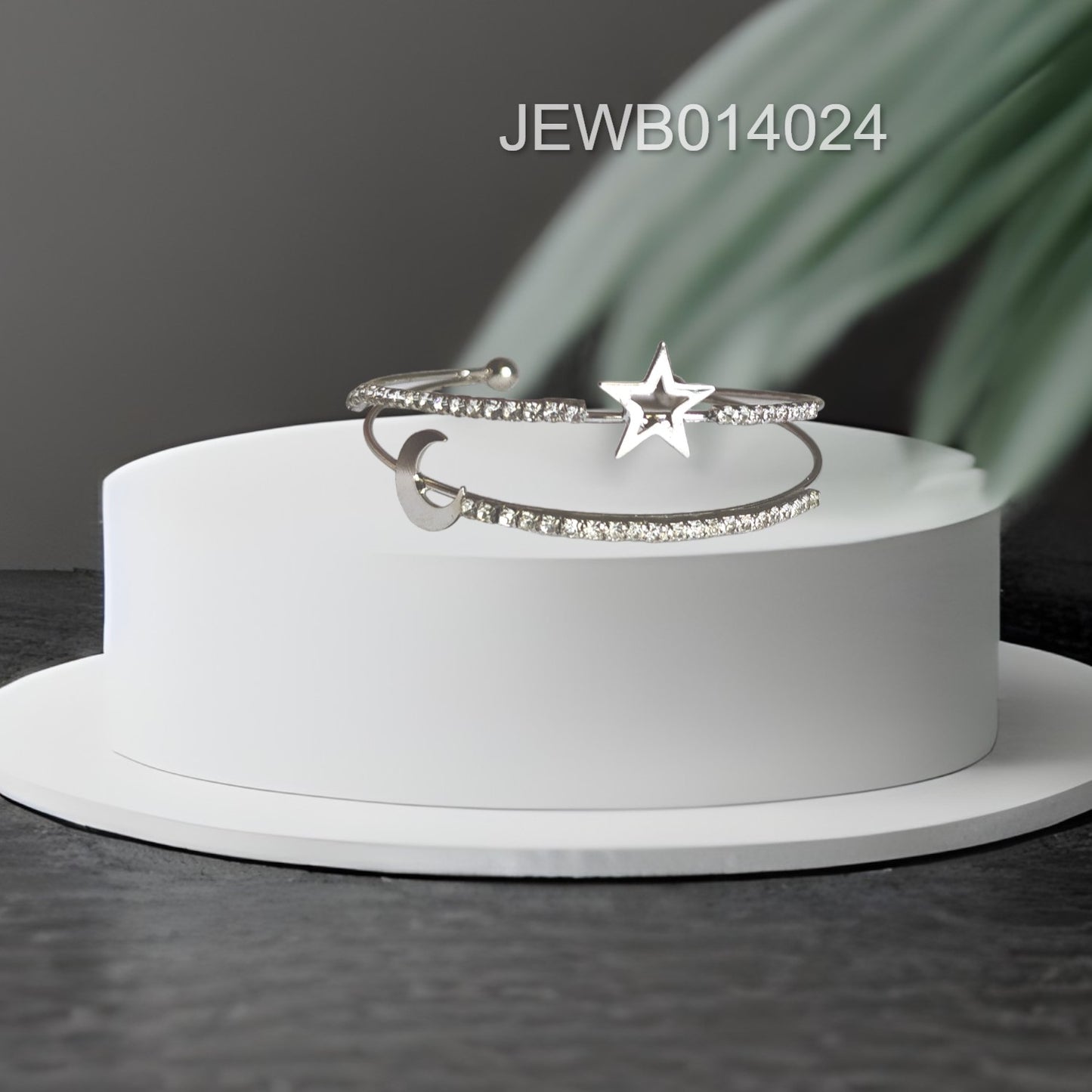 silver moon star bracelet grey background