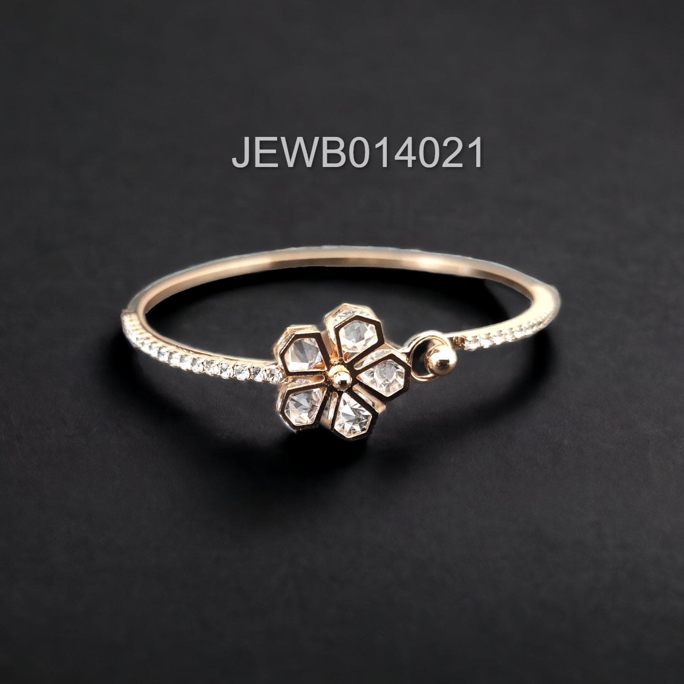 gold flower diamond bracelet black background