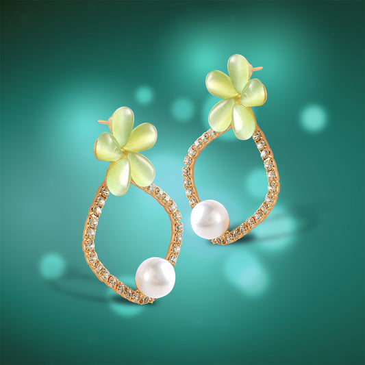 pastel green flower with pearl stud green background