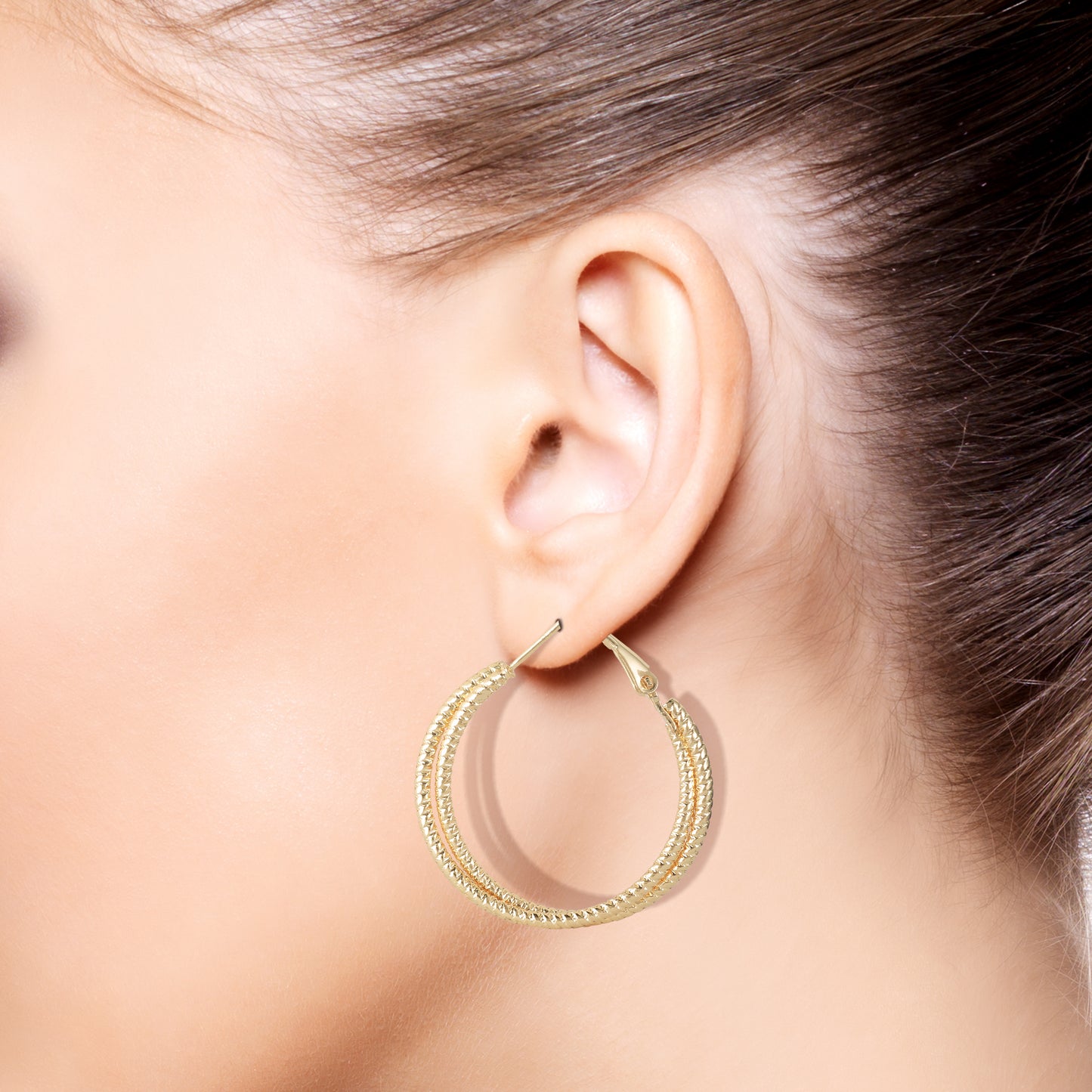 criss cross hoop earrings model pic
