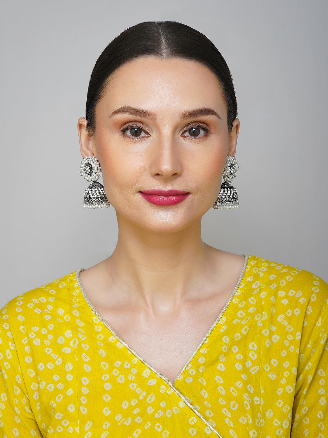 oxidised pearl stone jhumka model front view