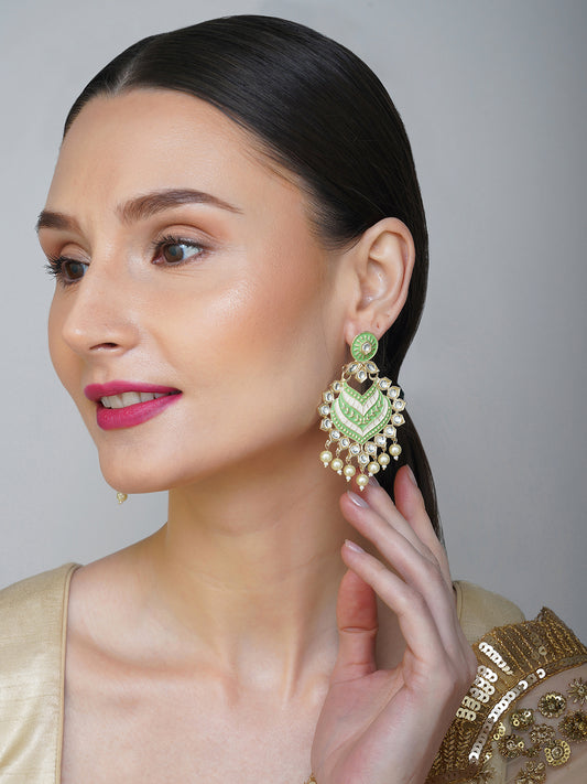 green kundan earrings model side view