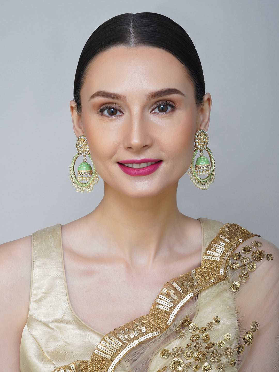 minakari green jhumki earrings for women model front view