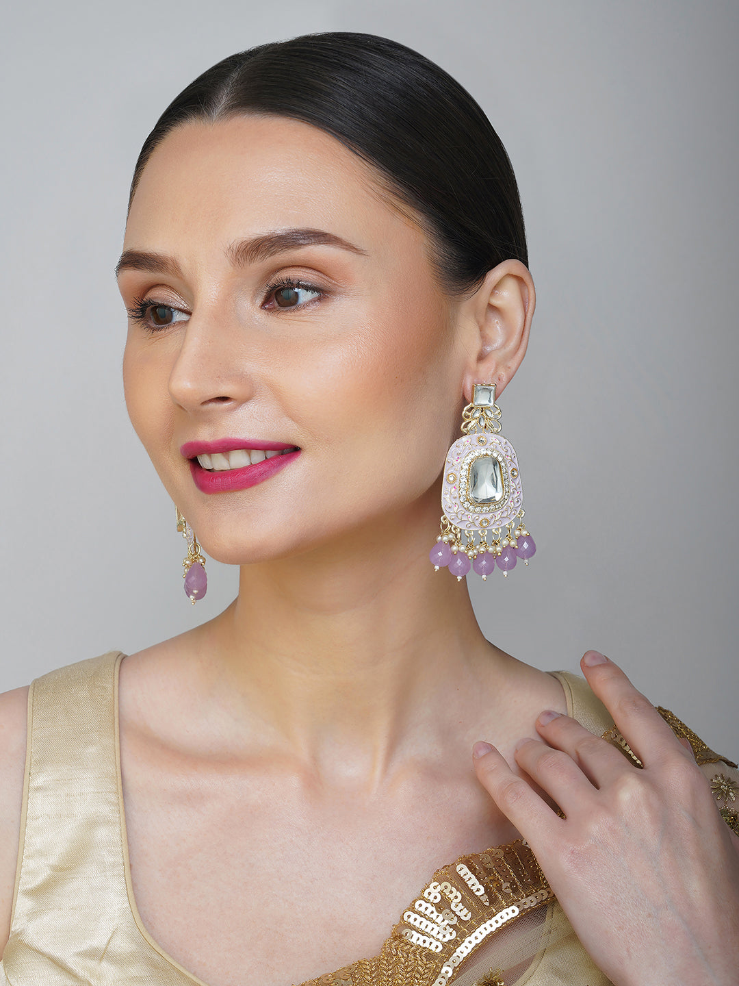 purple kundan minakari long earring model side view