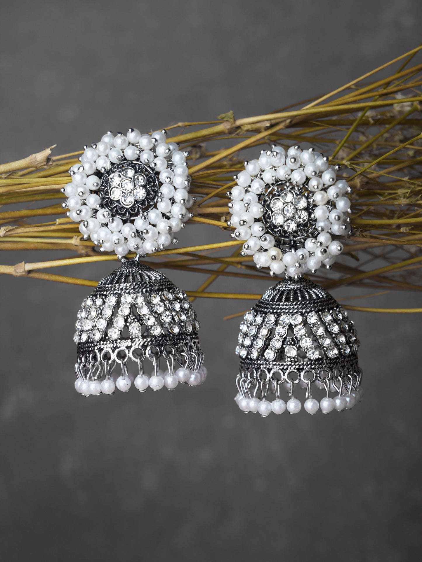 oxidised pearl stone jhumka grey background