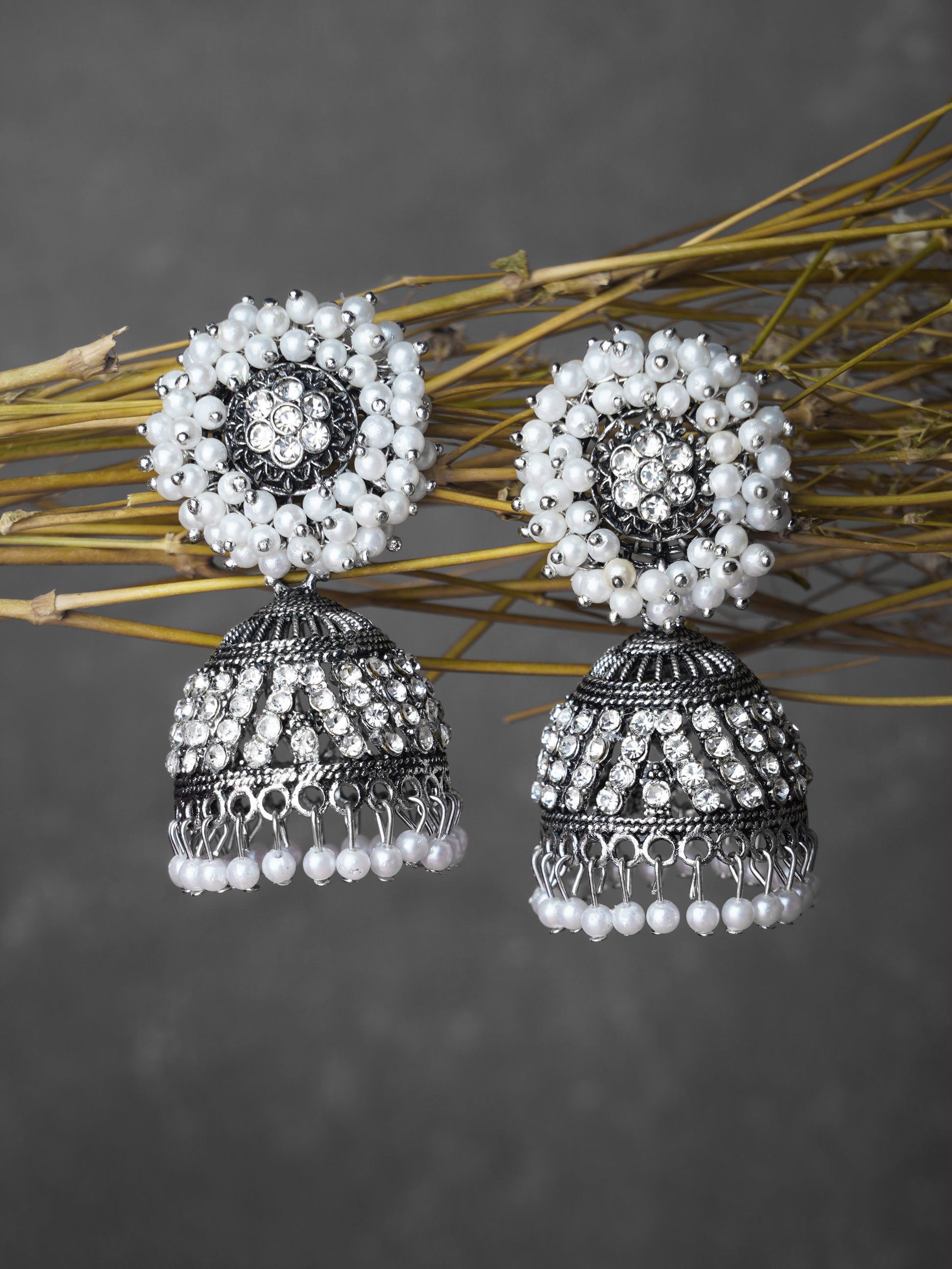 oxidised pearl stone jhumka grey background