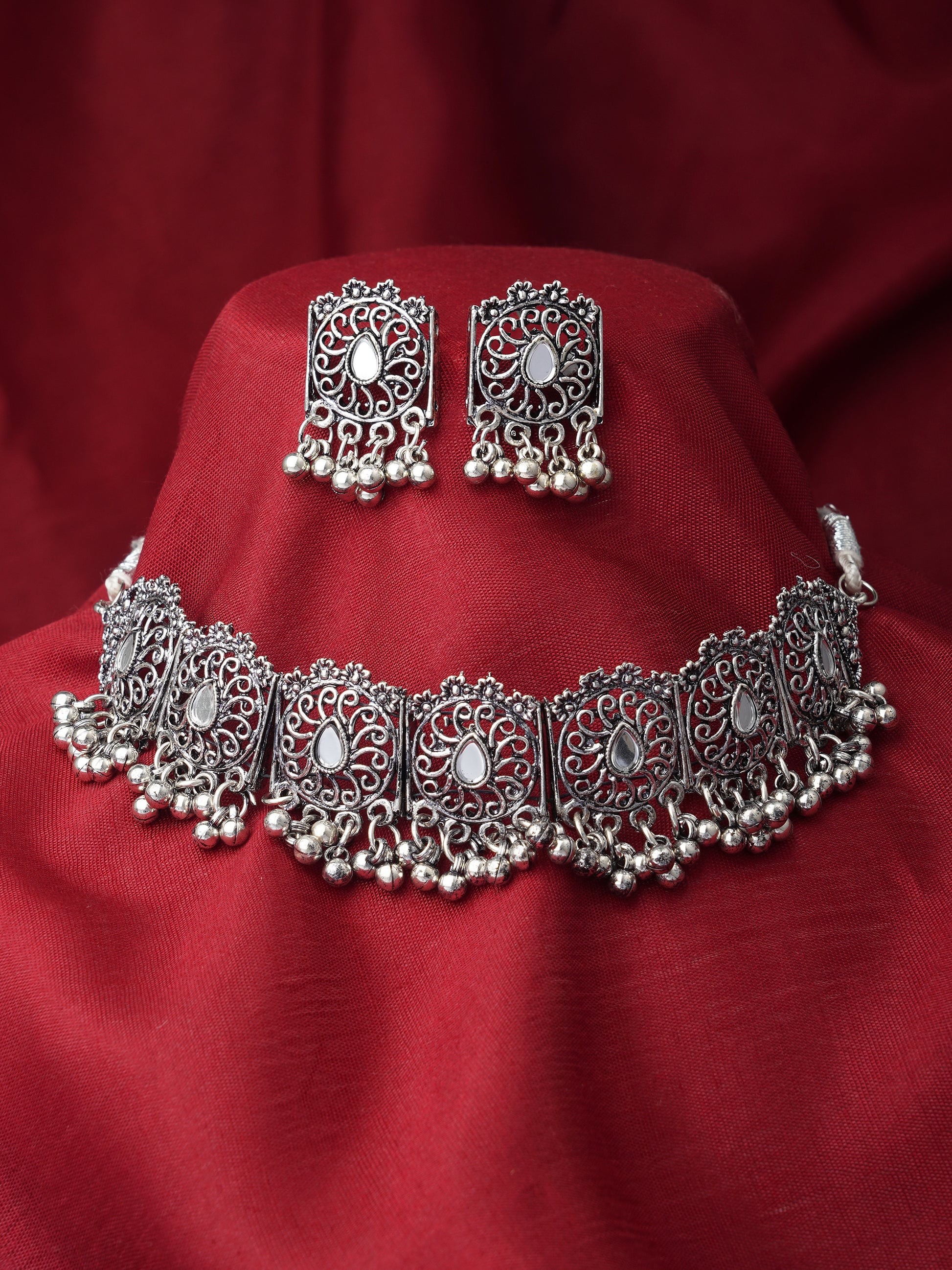 oxidised silver choker set red background