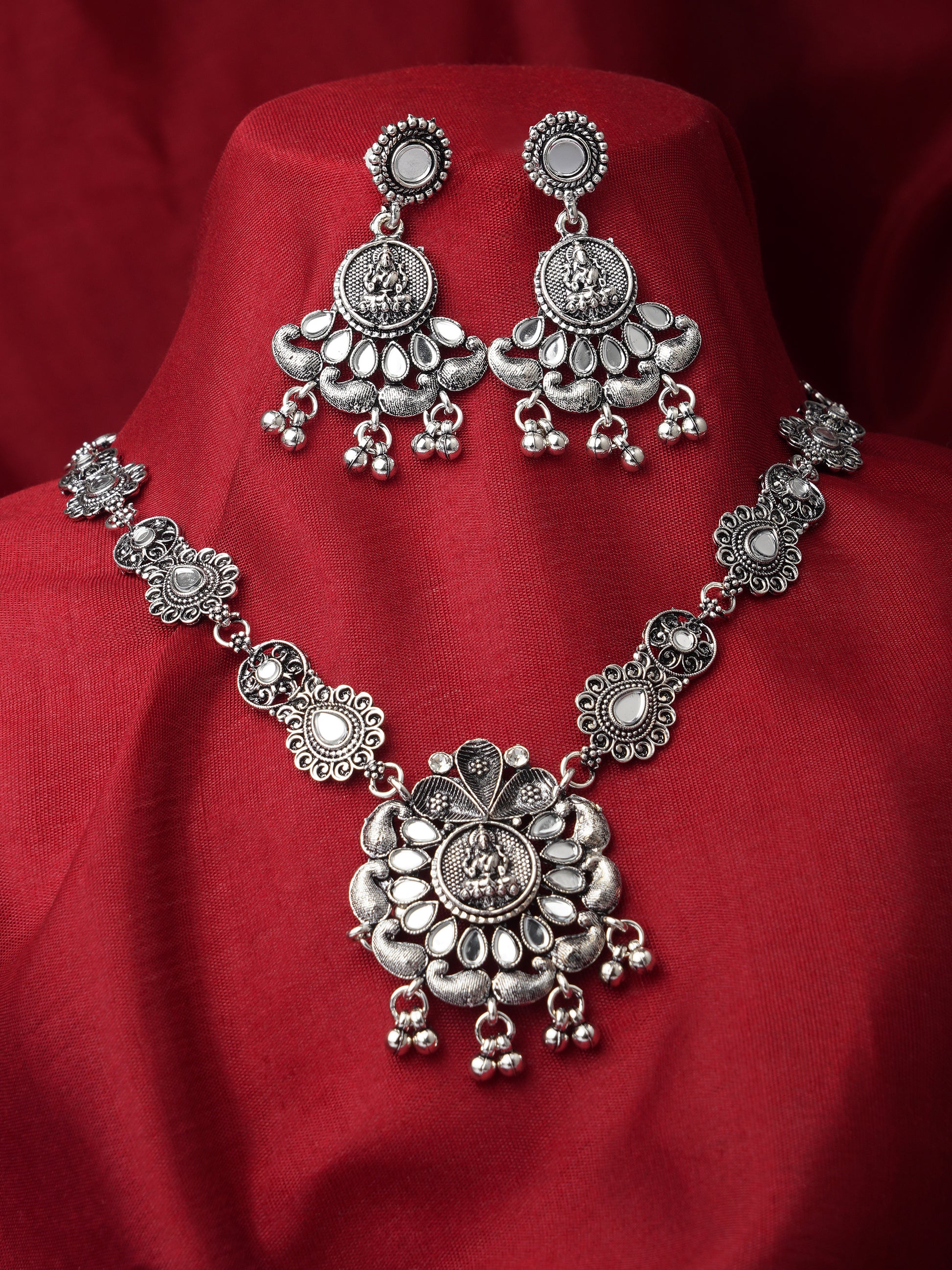 goddess lakshmi oxidised necklace set for women red background