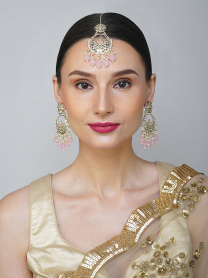 light pink earring and maang tikka  model front view