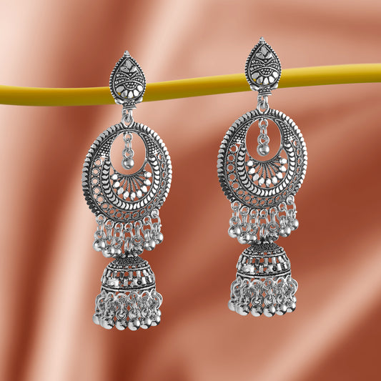 oxidized jhumka earrings peach background