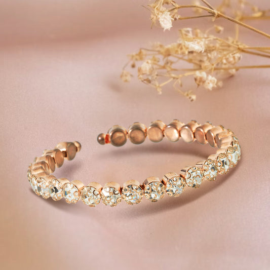 rose gold diamond bracelet peach background