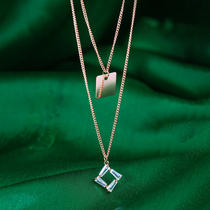 crystal rectangular pendant necklace green background