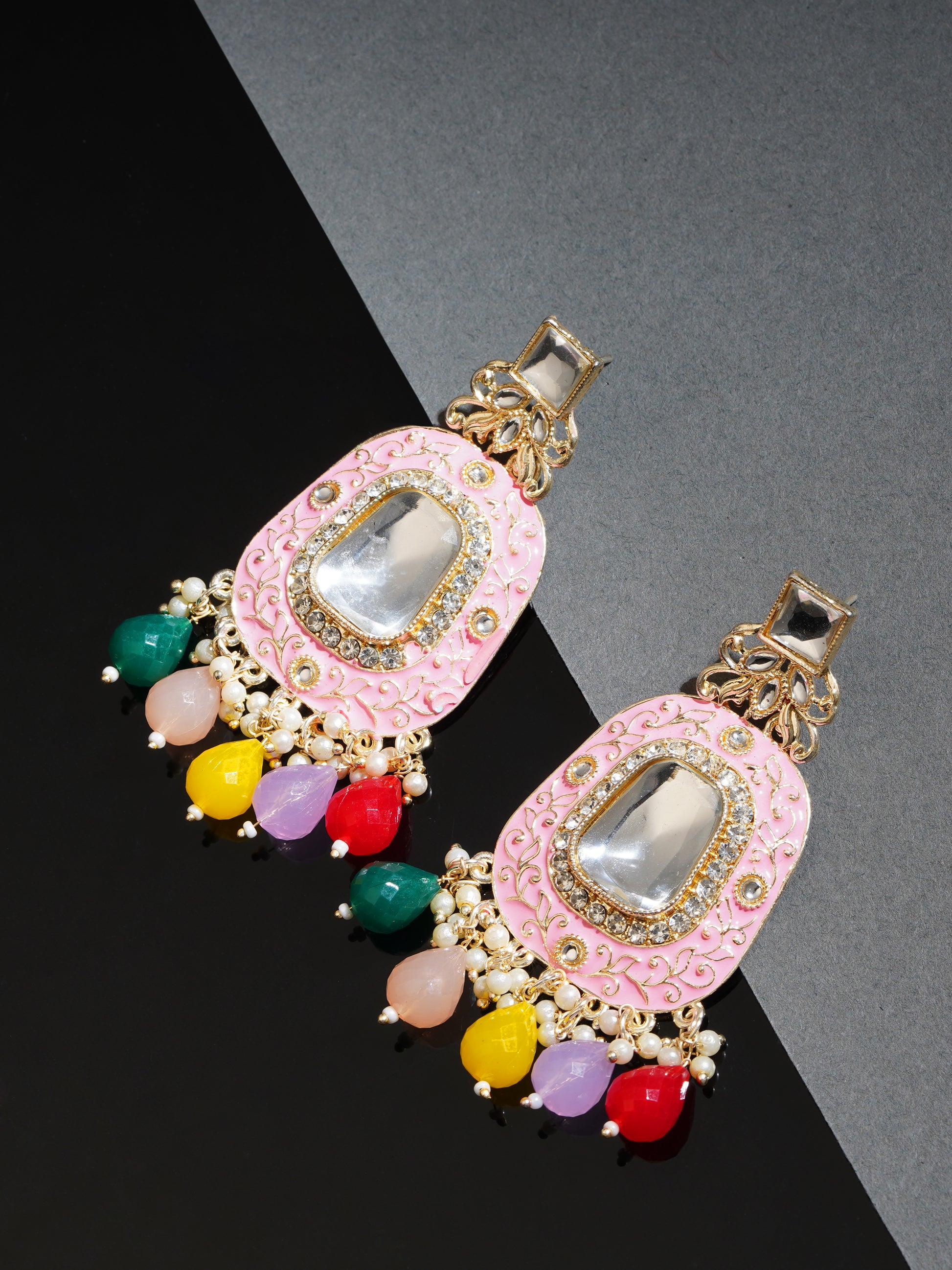 pink kundan minakari long earring black background