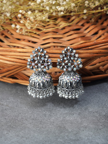 oxidise black jhumki earring wooden background