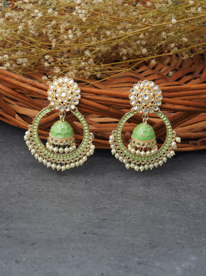 minakari green jhumki earrings for women wooden background