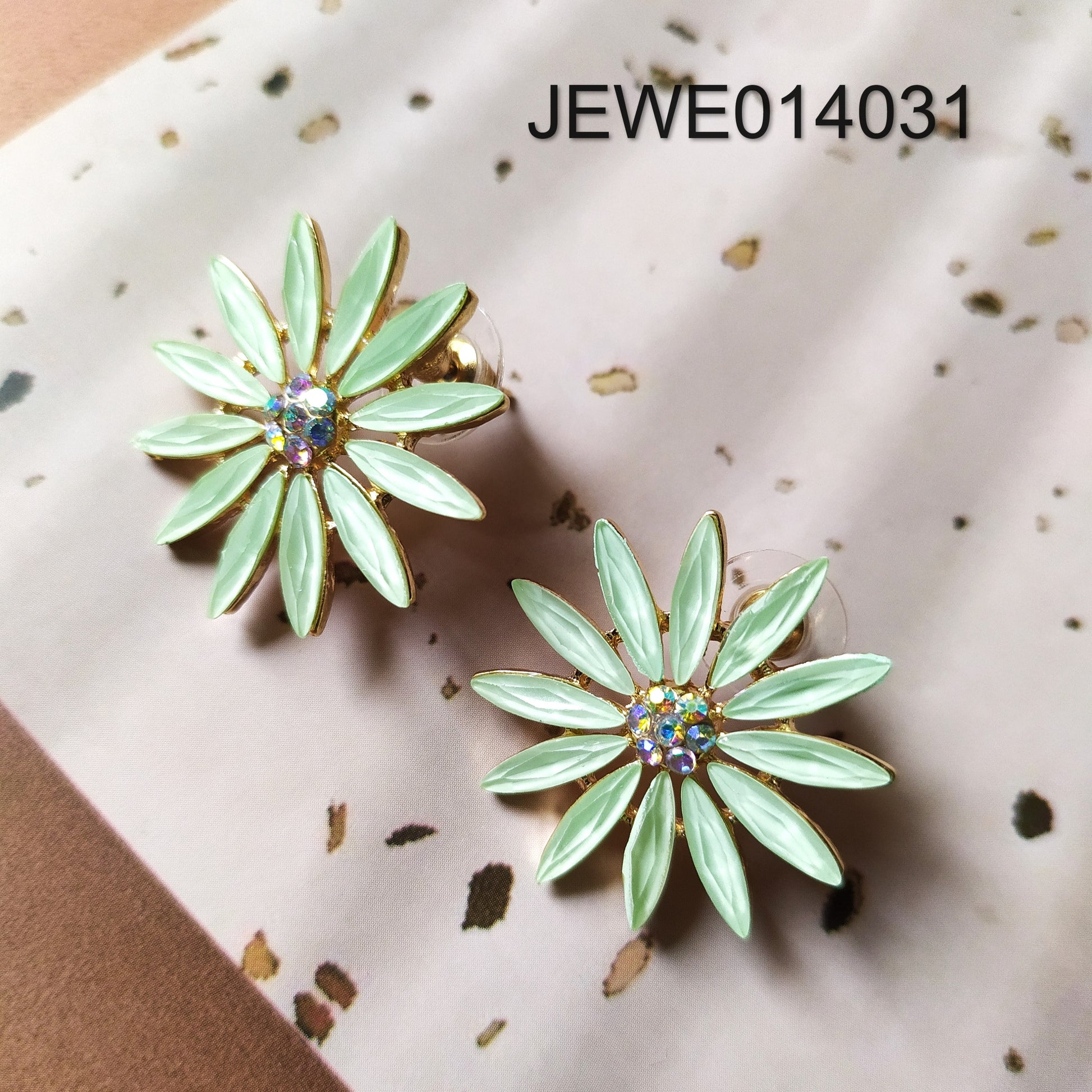 pastel green flower stud earring white background